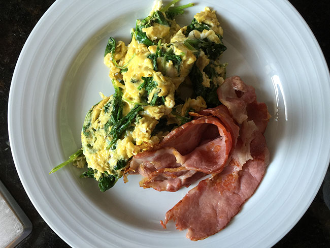 Eggs, spinach, and turkey bacon.